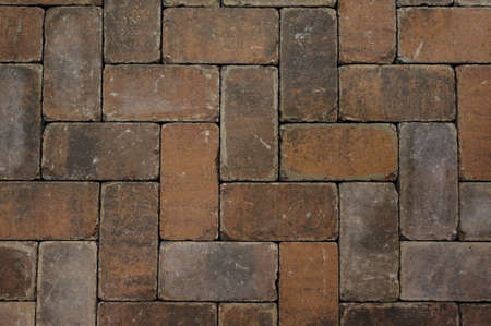 Red brick paving stones texture background photoの写真素材
