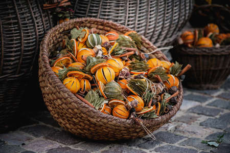 Dried fruits and nuts in bowl and basket sold at old marketの写真素材
