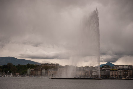 The famous fountain in Lake Geneva while rain.の写真素材