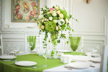 Beautiful flowers on table in wedding day. green apple themeの写真素材