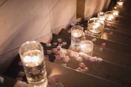 beautiful candle decoration on the stair for weddingの写真素材