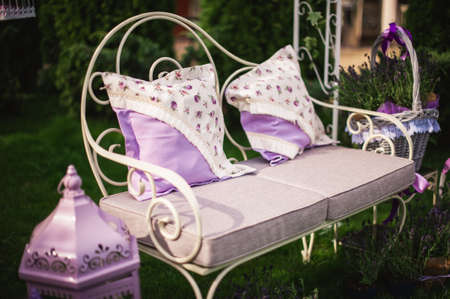 Outdoor patio seating are with nice sofa  and pillowsの写真素材