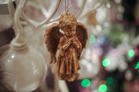 little beautiful golden angel toy Christmas decorationsの写真素材