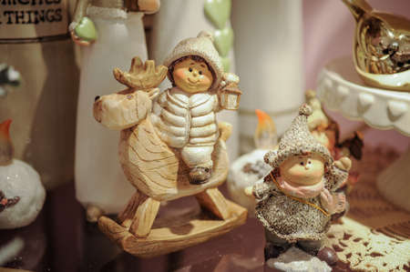 Christmas items on the  wooden shelf:  statue, statues, figuresの写真素材