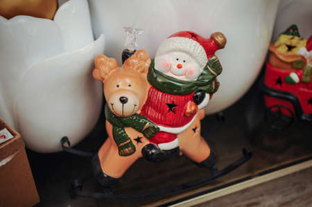 Christmas Decorative Composition With Snowman on shelfの写真素材