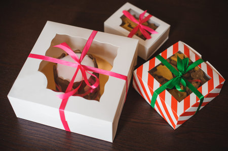 dog cake and cookie in boxes with ribbons
