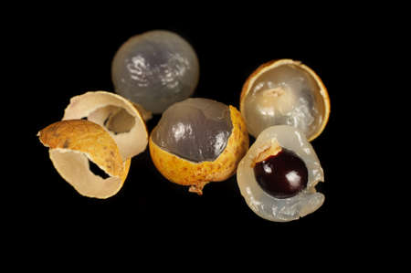Fresh longan Fruit isolate on the black  backgroundの写真素材