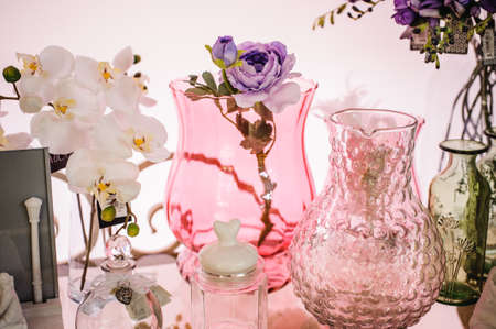 Pink Frosted Glass Vases home decor with flowersの写真素材