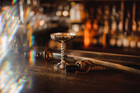 cocktail in a metal glass on barの写真素材
