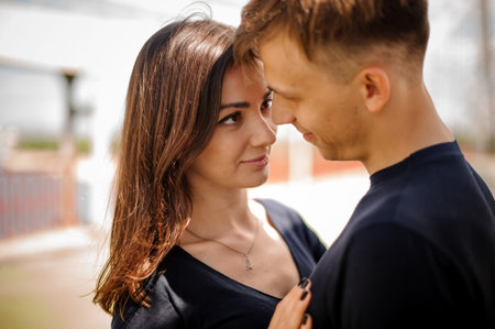 young happy lovers looking at each other