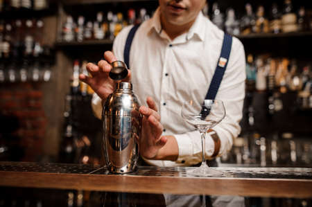 close up no face bartender making coctailの写真素材
