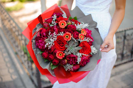 Bright bouquet. The combination of peonies, roses and a succulentsの写真素材