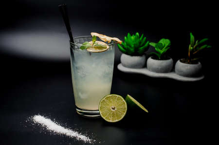 Fresh cocktail on the black background. Variation of margarita cocktailの写真素材