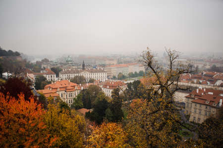 Misty old European town with a beautiful medieval architecture and trees in autumn. Europe conceptの写真素材