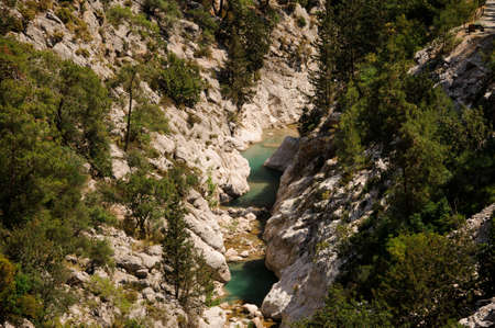 Amazing top view of Lycian Way with azure flowing river and green trees on sunny summer dayの写真素材