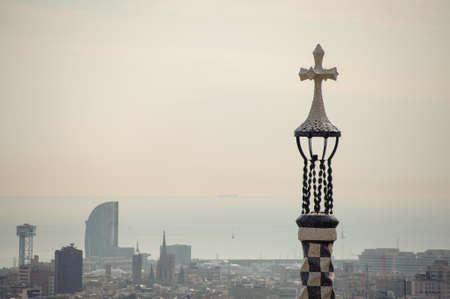 Top view of Park Guell in the background of morning mist under the sea and grey skyの写真素材