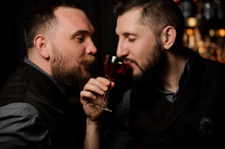 Two stylish bartenders in the night clubの写真素材