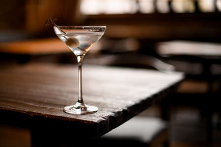 Delicious alcoholic cocktail in the glass decorated with a white ball on the skewerの写真素材