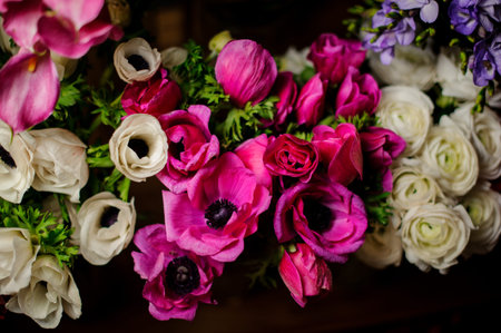 Beautiful bouquet of crimson poppy with green leaves