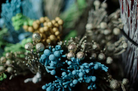 Bouquet of glittered blue, freen golden and siver decorationの写真素材