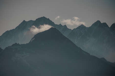 View of a mountain top in front of ridgeの写真素材