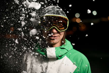 Portrait of dude in winter sportswear and glassesの写真素材