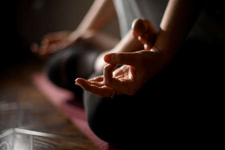 close-up hand of girl which making special gesture for yoga pose.の写真素材