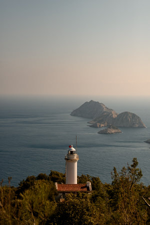 Beautiful view of Gelidonya Lighthouse at Turkey facing to Mediterranean sea and three islands on Lycian Way.の写真素材