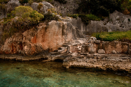 view of the stone steps and ruins of the sunken ancient Lycian city