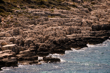 close-up view of the stones of the rocky coast of the Mediterranean Sea