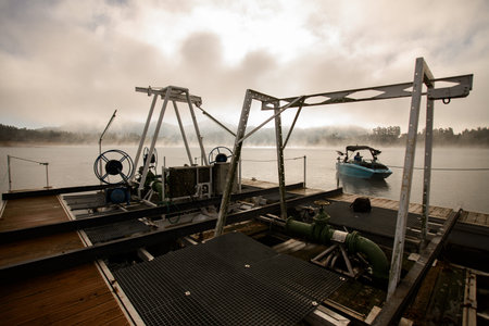 specially equipped pier and a boat sailing up to it