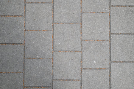 Top view on texture of square paving slabs