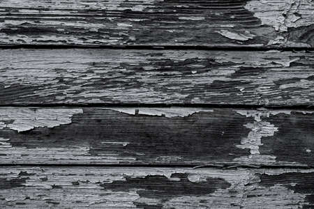 close-up of horizontal old wooden planks with shabby paintの写真素材
