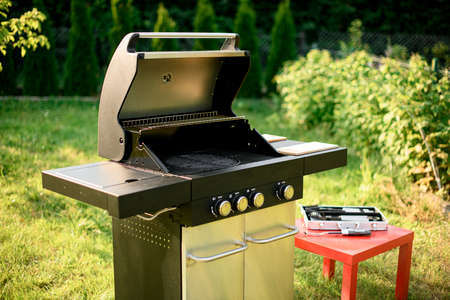 Beautiful close-up view on modern portable BBQ barbecue grillの写真素材