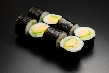 classic vegetarian sushi rolls with tofu and rice wrapped in nori.の写真素材
