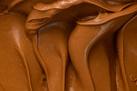 Chocolate ganache. milk chocolate cream to fill or decorate desserts or cakes. Top viewの写真素材