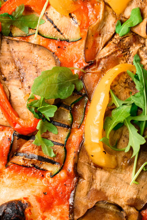 Appetizing wallpaper with delicious and healthy colorful vegan whole grain vegetables pizzaの写真素材