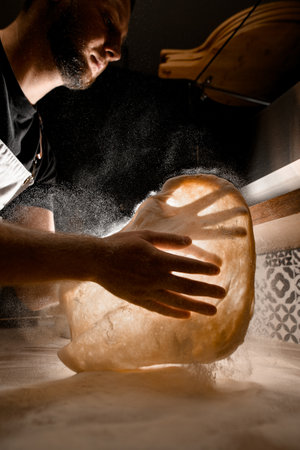 Expertise on display. Chef pizza dough tossing technique.の写真素材