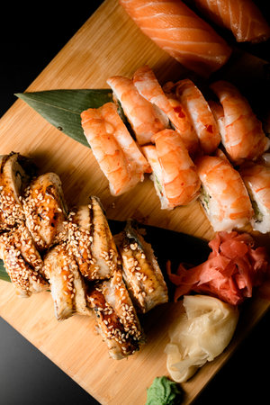 Focus on fried rolls with tuna, philadelphia with shrimpの写真素材
