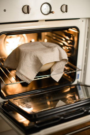 Various Easter dishes baking in the oven for a festive meal.の写真素材