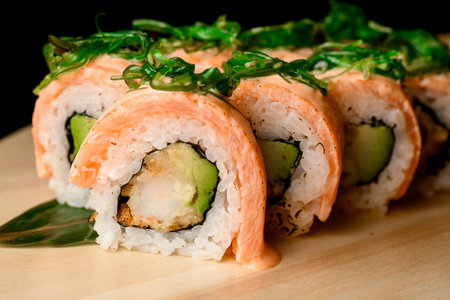 Salmon rolls with nori in a diverse sushi selectionの写真素材