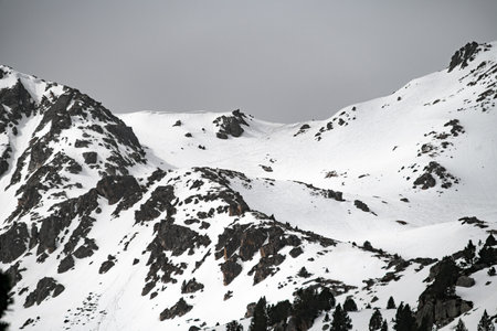 Beautiful mountain landscape of snowy spring mountainsの写真素材
