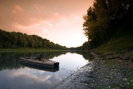Peaceful scenic view of river and landscape in Summerの写真素材