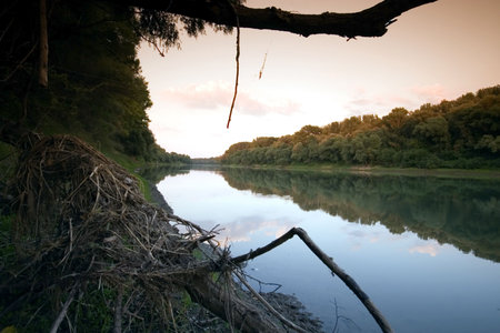 Peaceful scenic view of river and landscape in Summer