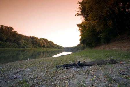 Peaceful scenic view of river and landscape in Summerの写真素材