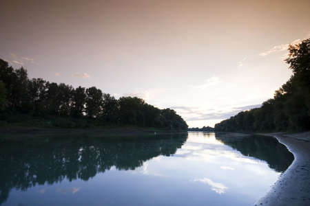 Peaceful scenic view of river and landscape in Summerの写真素材