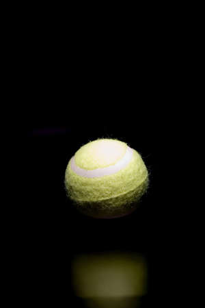 Tennis ball with racketの写真素材