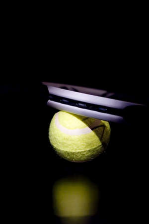 Tennis ball with racketの写真素材