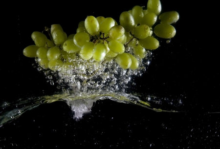 Splashing grapeの写真素材