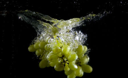 Splashing grapeの写真素材